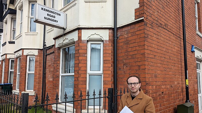 Coventry South PPC Stephen Richmond in front of the now closed Kensington Road GP Surgery in Earlsdon